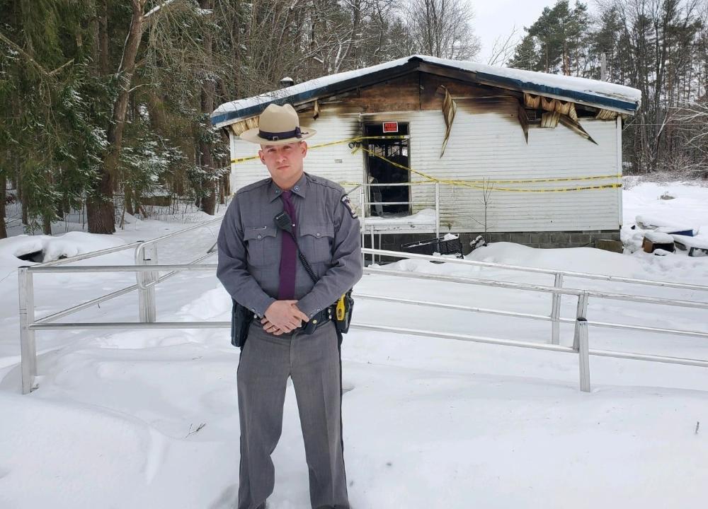 State Trooper in Machias Credited with Saving Woman from Burning Home