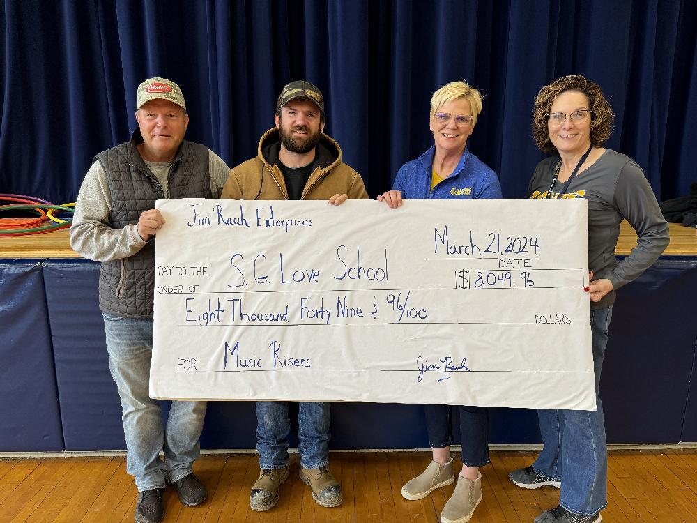 Business Owner Donates New Risers to Love Elementary School ...